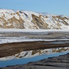 Spiegelung am Strand